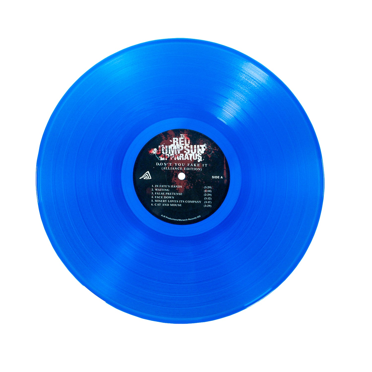 A translucent clear blue vinyl record with a circular black label displaying white and red text and graphics, photographed from above on a white background. Perfect for collectors of The Red Jumpsuit Apparatus.