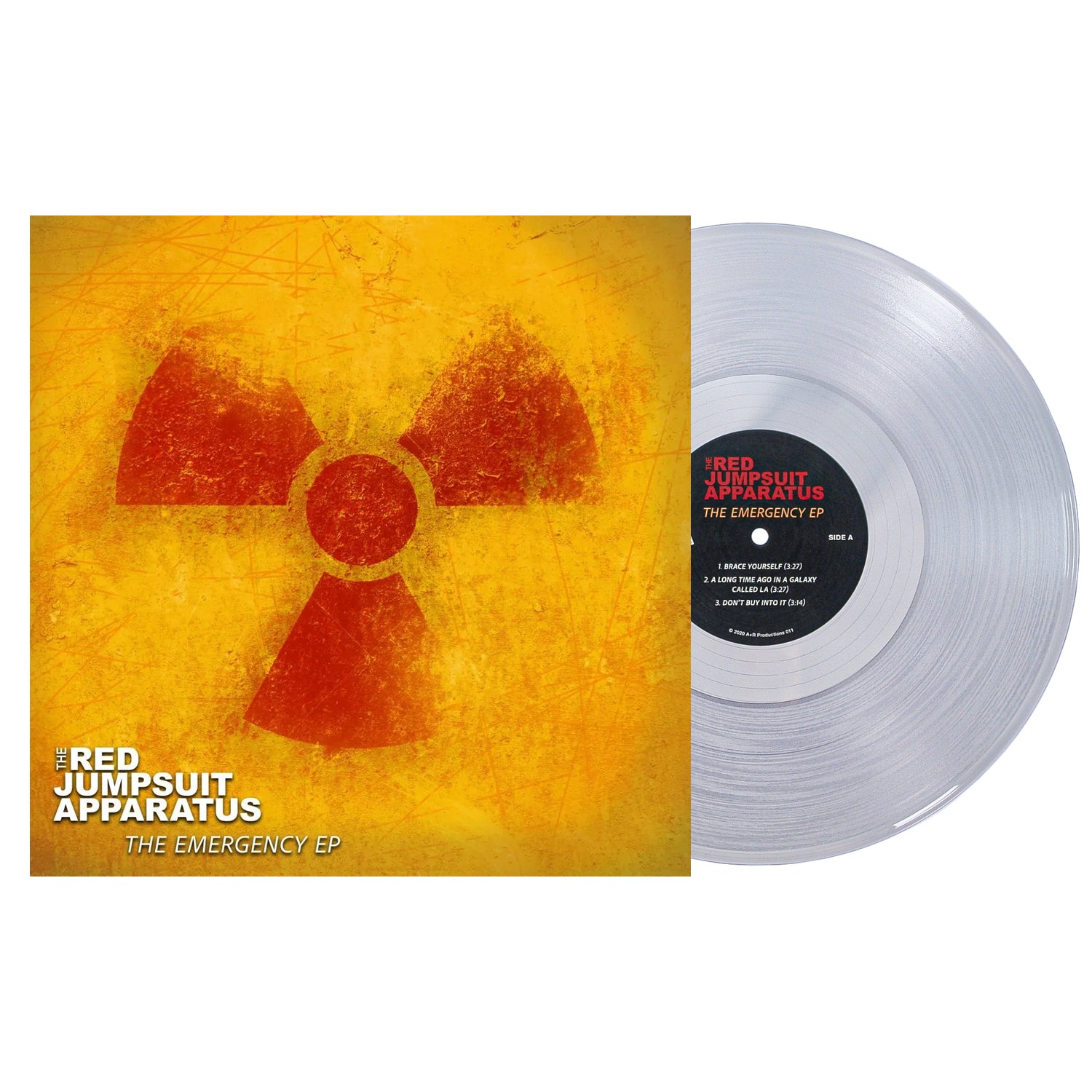 The image shows a clear vinyl and its cover, which has a yellow-orange grunge background with a bold radiation symbol. The Red Jumpsuit Apparatus brand name and Emergency EP title are displayed in striking white text.